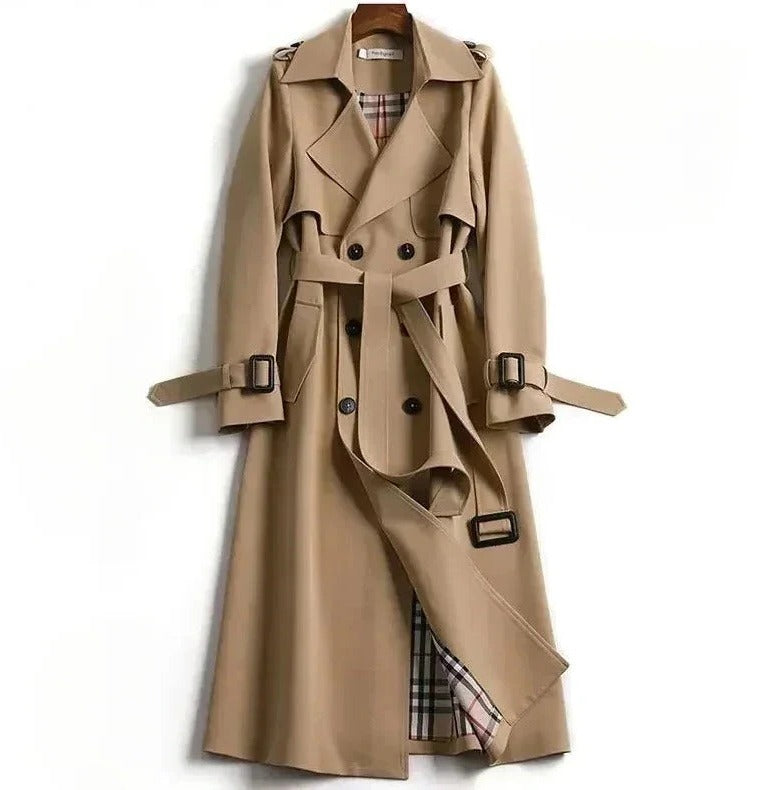 Women's mid-length structured trench coat in classic neutral tone with polished silhouette
