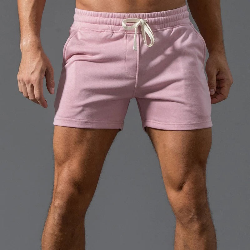 Men's lightweight casual sports shorts in neutral tone with elastic drawstring waistband for versatile everyday wear