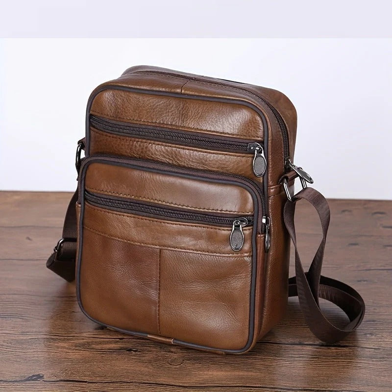Men's black structured shoulder bag with multi-pocket organization, slim profile for professionals