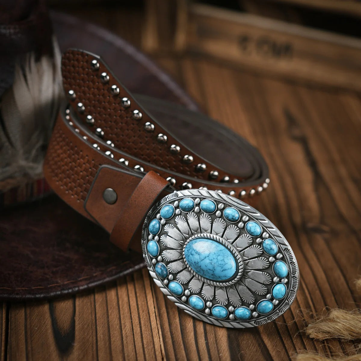 Men's hand-tooled brown leather western belt with ornate brass buckle, floral tooling, casual formal