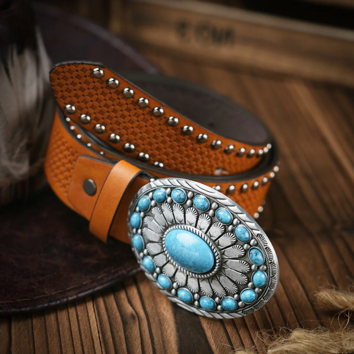 Men's hand-tooled brown leather western belt with ornate brass buckle for casual and formal wear