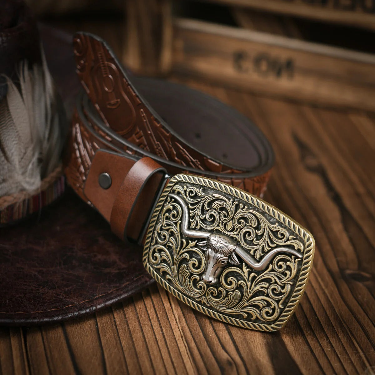 Men's brown hand-tooled leather Western belt with ornate brass buckle, floral detailing, casual formal
