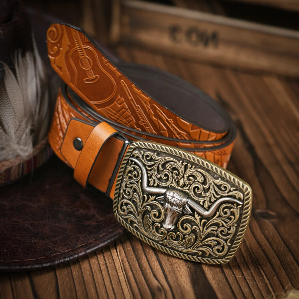 Men's hand-tooled brown leather western belt with ornate brass buckle for casual and formal wear