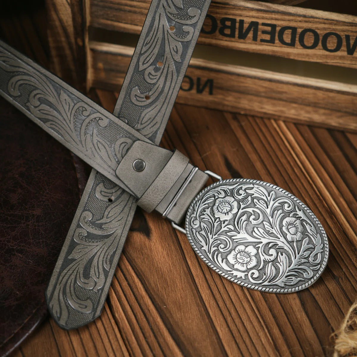 Men's hand-tooled brown leather western belt with ornate brass buckle for casual and formal wear