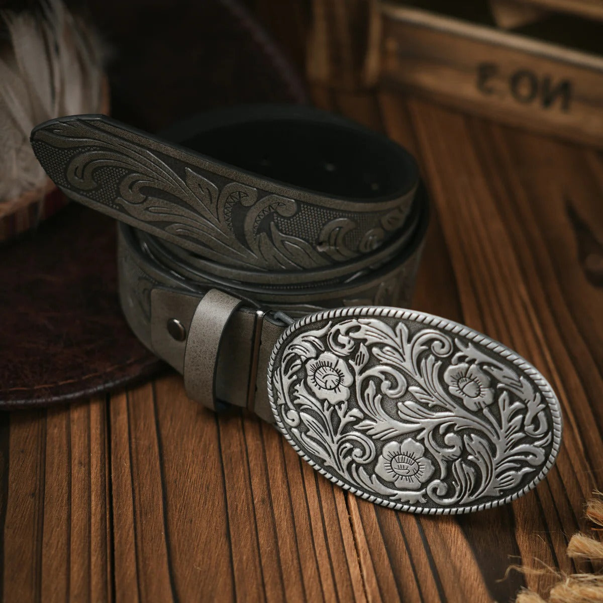 Men's hand-tooled brown leather western belt with ornate brass buckle for casual and formal wear