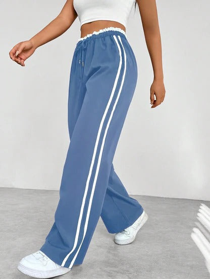 Black wide-leg athleisure pants relaxed sporty cut with adjustable drawstring elastic waistband