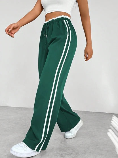 Black wide-leg sporty pants relaxed athleisure fit with adjustable drawstring elastic waistband