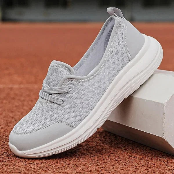 Women's light gray mesh orthopedic sneakers with three-arch support system for everyday casual wear
