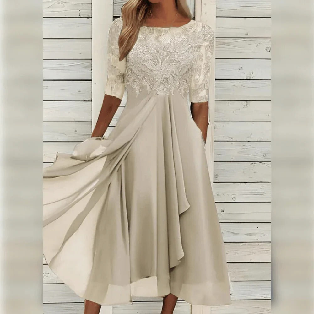 Women's elegant lace bodice dress with flowing chiffon skirt, timeless style for special occasions