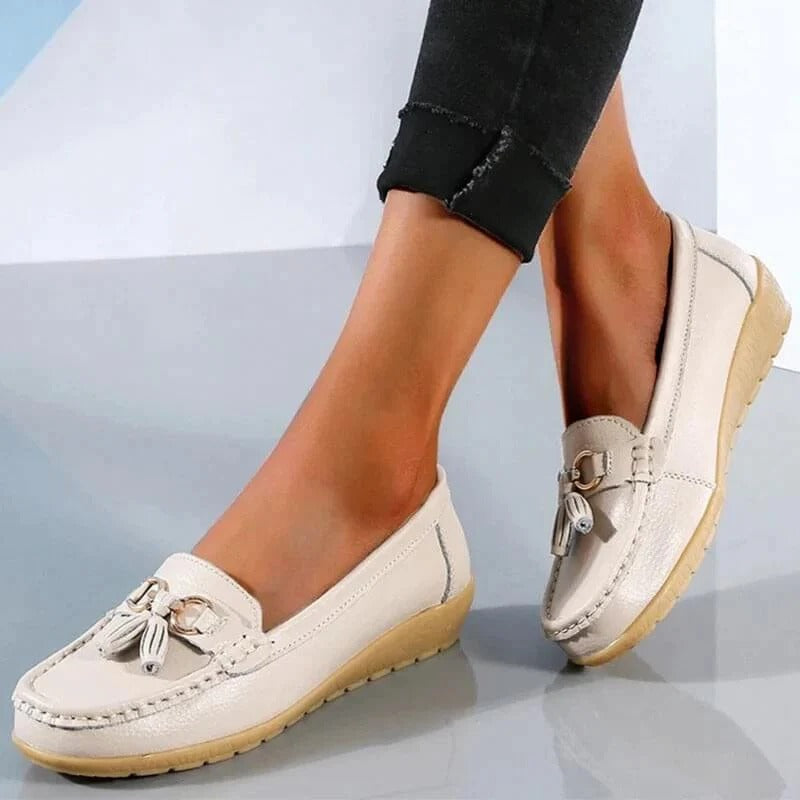 Women's black premium leather orthopedic loafers with ergonomic insole and professional slip-on design