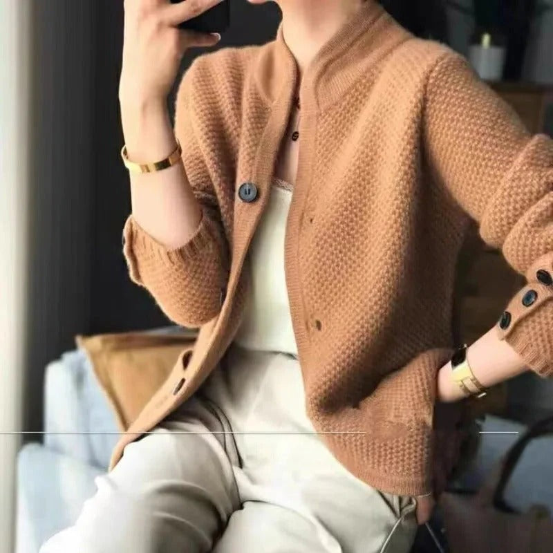 Women's cream classic-fit waist-length cardigan with front button closure for versatile everyday layering