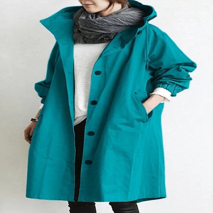 Women's water-resistant hooded overcoat, breathable weatherproof fabric, elegant slim silhouette