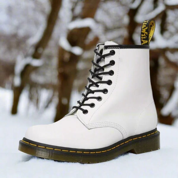 Men's brown leather ankle boots lace-up style with bold yellow stitch detailing for a modern edge