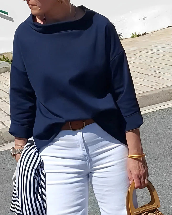 Women's elegant high collar long sleeve top minimalist silhouette versatile desk-to-dinner style