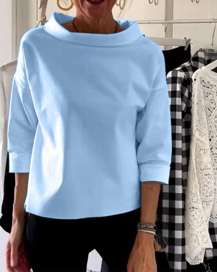 Women's elegant high collar long sleeve top minimalist silhouette versatile desk-to-dinner style