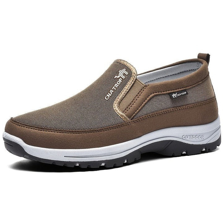 Men's gray orthopedic slip-on shoes with wide toe box, arch support, and waterproof design