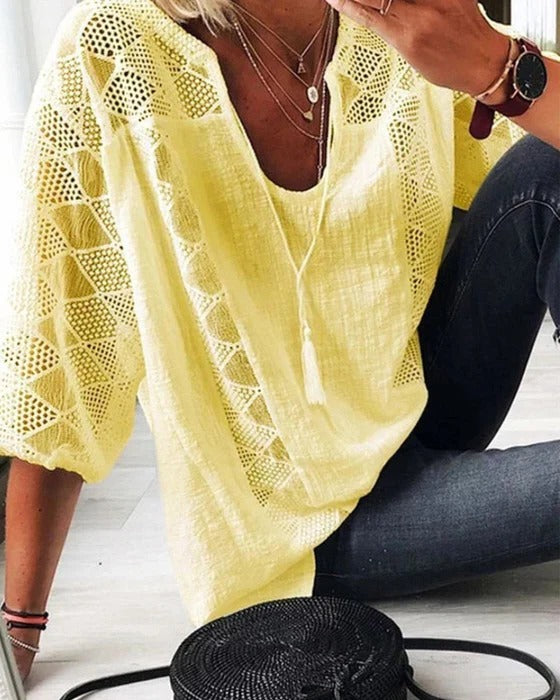 Women's lightweight relaxed-fit blouse with modern slit-neck detail, breathable summer top for warm days