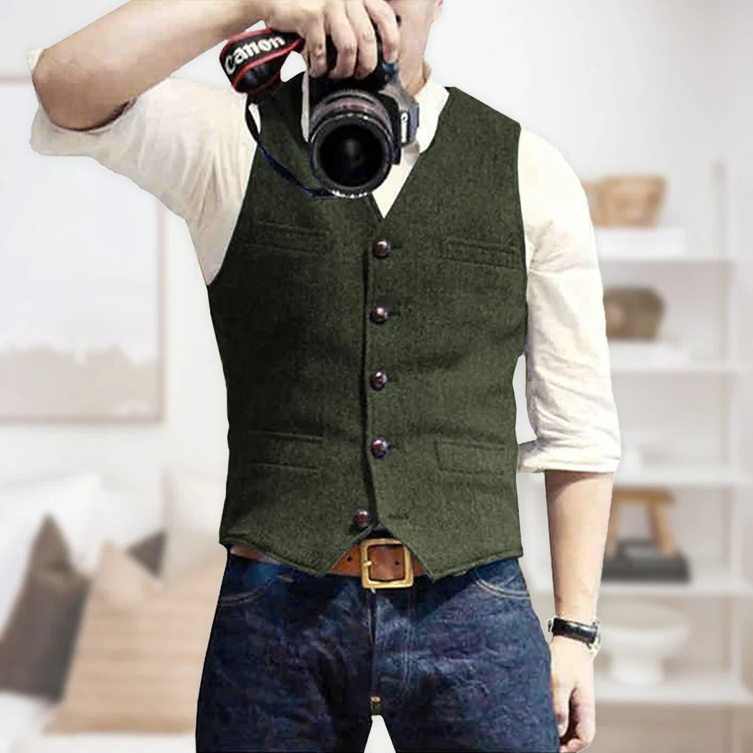 Men's sleeveless vintage denim vest with button front placket, lightweight layering essential