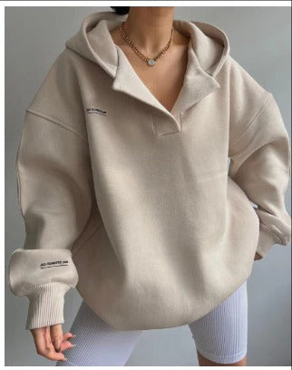 Women's relaxed-fit cozy hoodie in neutral tone, casual everyday layer for cold weather comfort