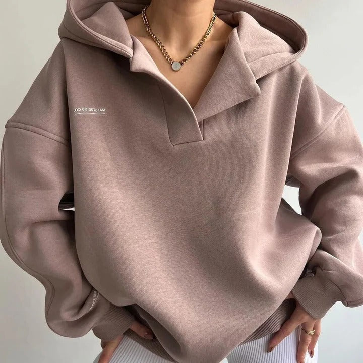 Women's relaxed fit casual hoodie in cozy neutral tones with clean modern styling for cold weather layering