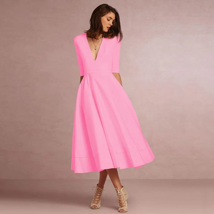 Women sleeveless princess-cut dress elegant fitted bodice sweeping full-length skirt formal occasion