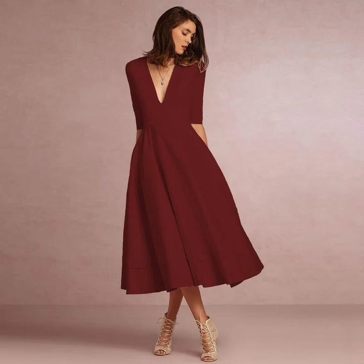 Women sleeveless princess dress elegant fitted bodice sweeping full-length skirt formal occasion