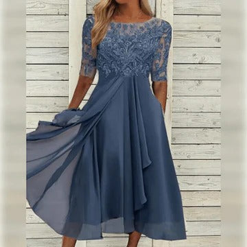 Women's elegant midi dress with lace bodice accent, flowing skirt, timeless silhouette for formal or casual wear