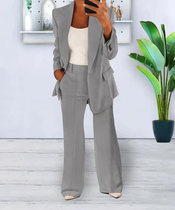 Women's elegant two-piece suit in classic tailored jacket and trousers for polished professional style