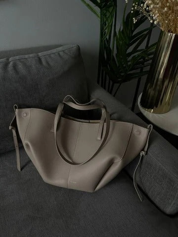 Vintage women's tote bag elegant spacious carryall with structured silhouette for all-day use
