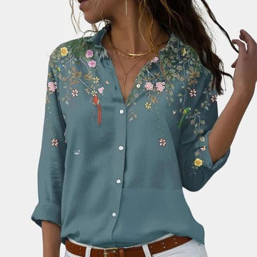 Floral women's blouse refined tailored silhouette curved seams relaxed hemline office-to-evening