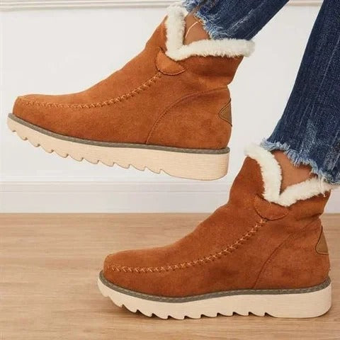 Black insulated ankle boots with warm lining, cold weather outdoor style for urban winter comfort