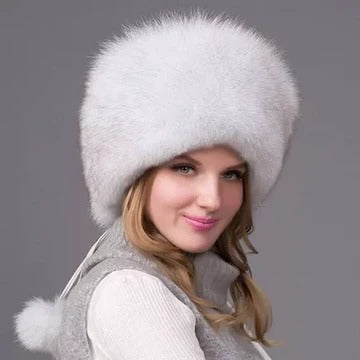 Women's fur knit beanie with integrated earmuffs, full coverage winter hat for cold weather