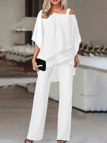 Elegant black layered cold-shoulder two-piece pant set with wide-leg trousers and open-shoulder detail