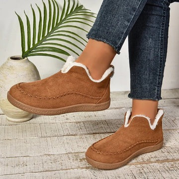 Women's insulated winter comfort shoes with plush lining and non-slip traction for daily cold-weather wear