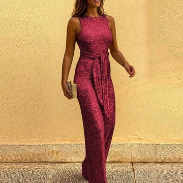 Women's silver glitter jumpsuit formal one-piece fitted silhouette with reflective sparkle finish