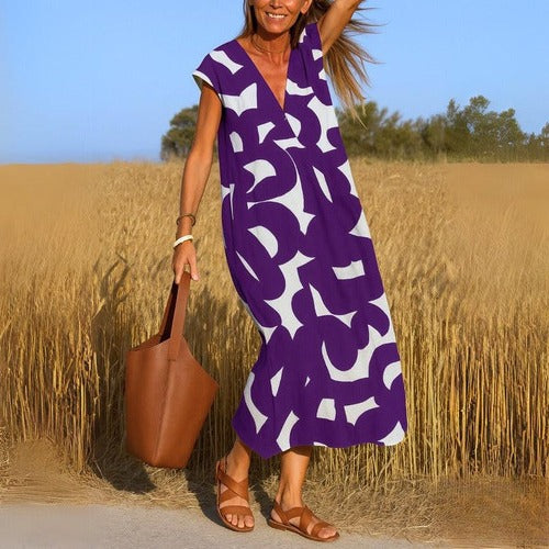 Women's printed V-neck casual dress lightweight flowing silhouette travel-ready warm weather style
