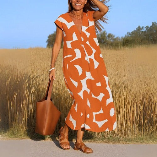 Women's printed v-neck casual dress lightweight flowing fabric relaxed silhouette travel-ready
