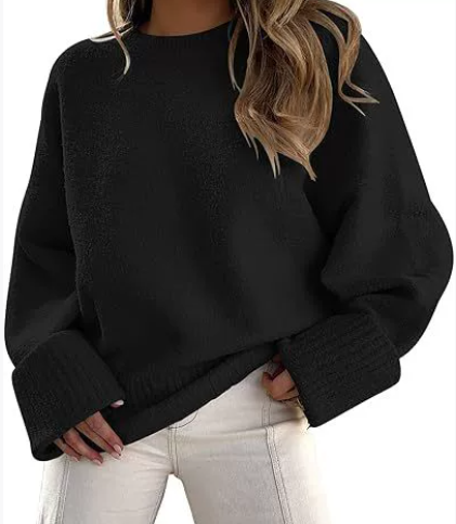 Women's oversized drop-shoulder knit sweater in soft plush yarn with relaxed cozy silhouette