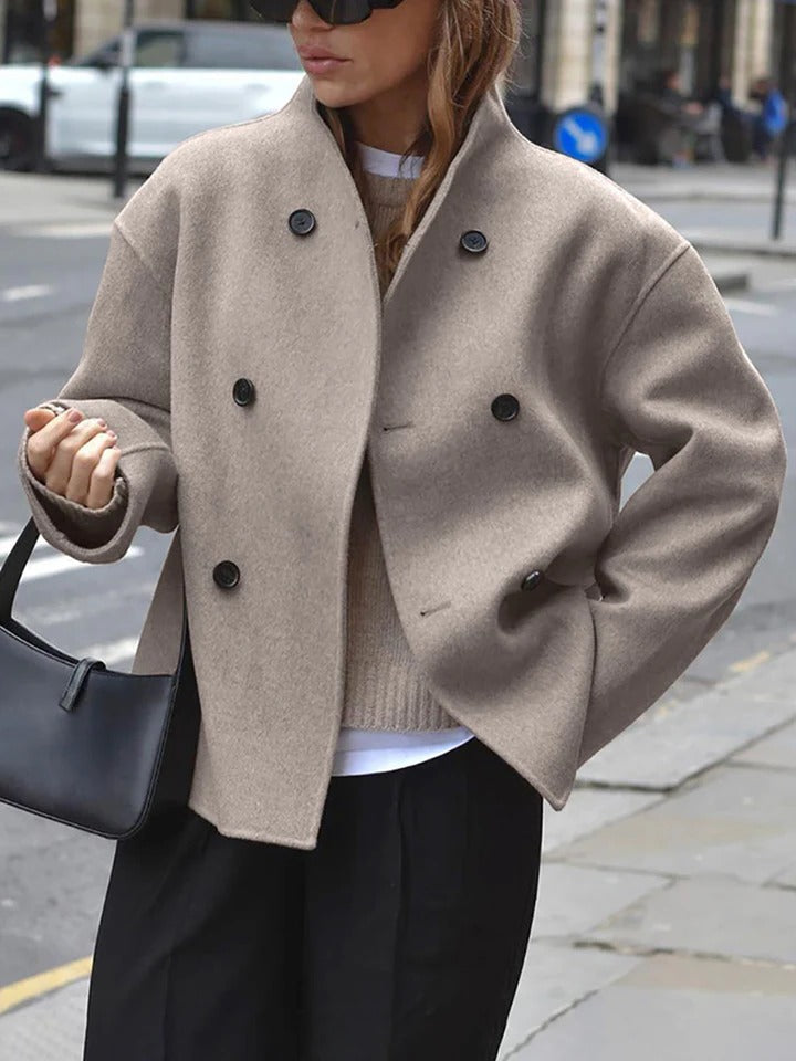 Women's loose fit stretch fabric jacket with button front closure and dropped shoulders for layering