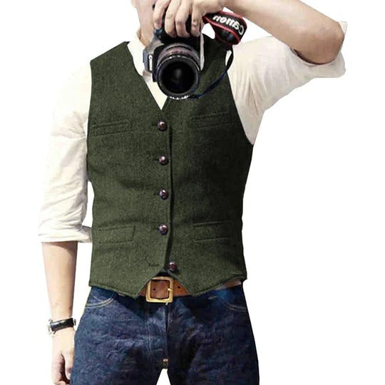 Men's blue denim vest with button closure, tailored slim fit, and multiple practical pockets for casual layering