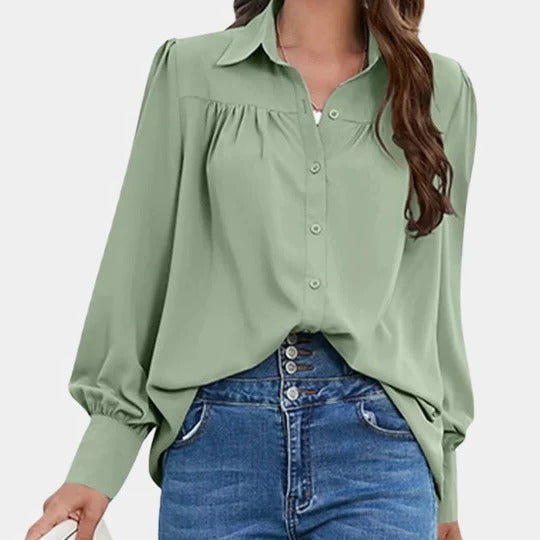 Women's solid color office blouse with shirt collar and dramatic lantern sleeves for professional look