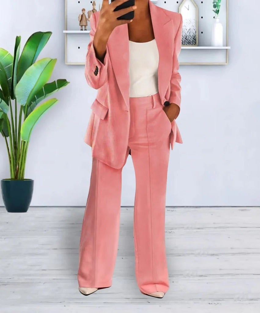 Women two-piece structured jacket top and matching trousers set, clean professional silhouette everyday wear