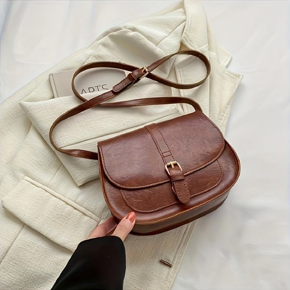 Michele small rectangular vegan leather crossbody bag with adjustable strap and buckle closure