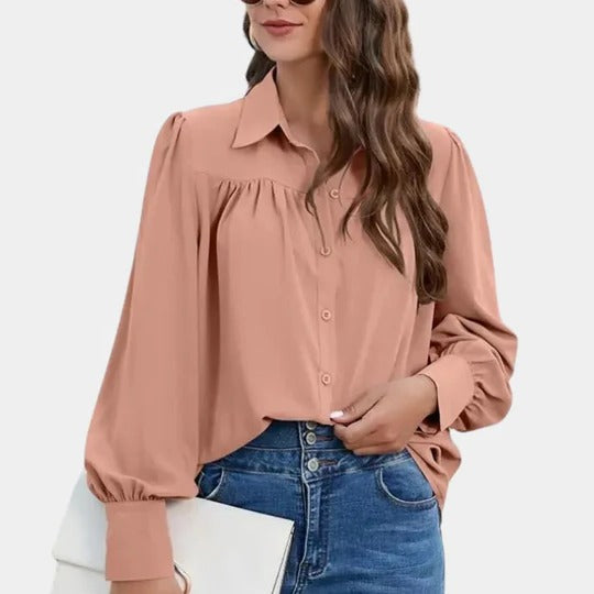 Women's solid color office blouse with shirt collar and dramatic lantern sleeves for professional look