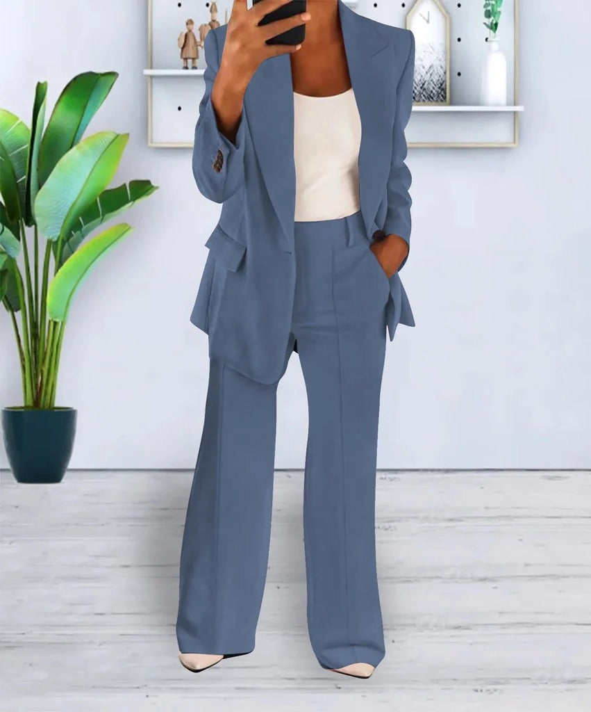 Women two-piece structured jacket top and matching trousers set, clean professional silhouette everyday wear