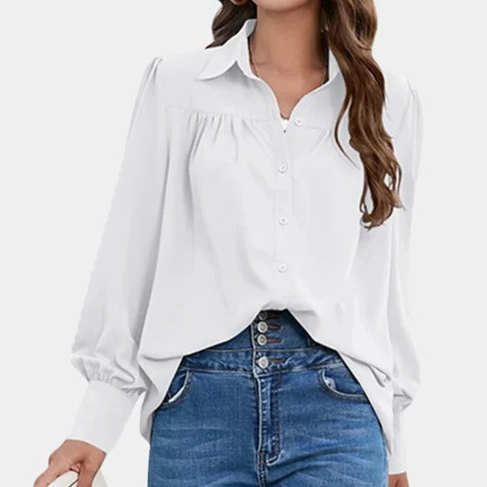Women's solid color office blouse with shirt collar and dramatic lantern sleeves for professional look