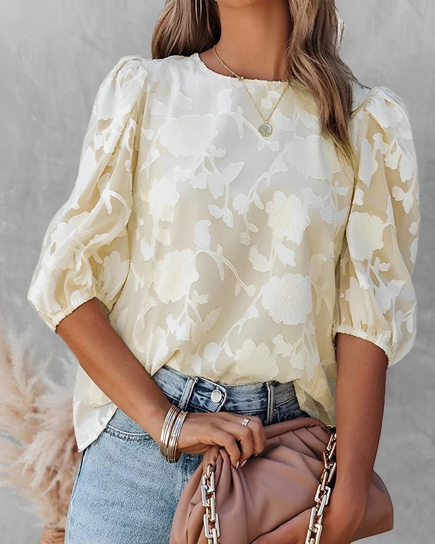 Women's white collarless button-front shirt with structured puff sleeves and gathered volume detail