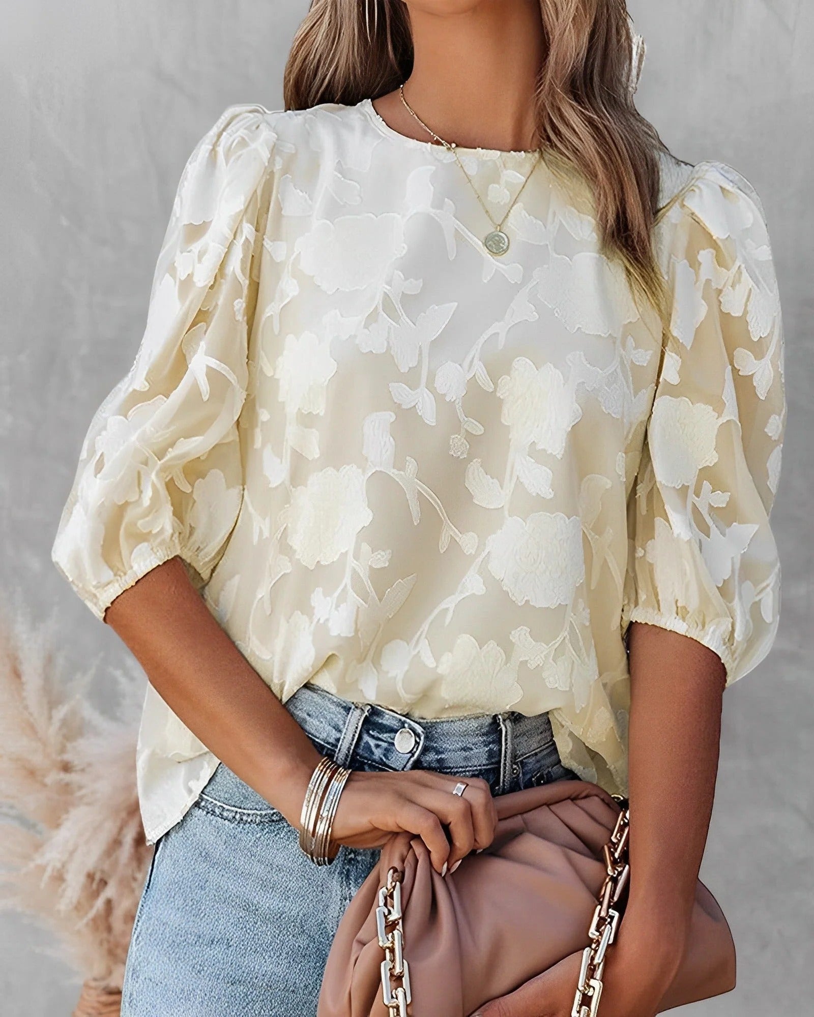 Women's white collarless button-front shirt with structured puff sleeves and gathered volume detail