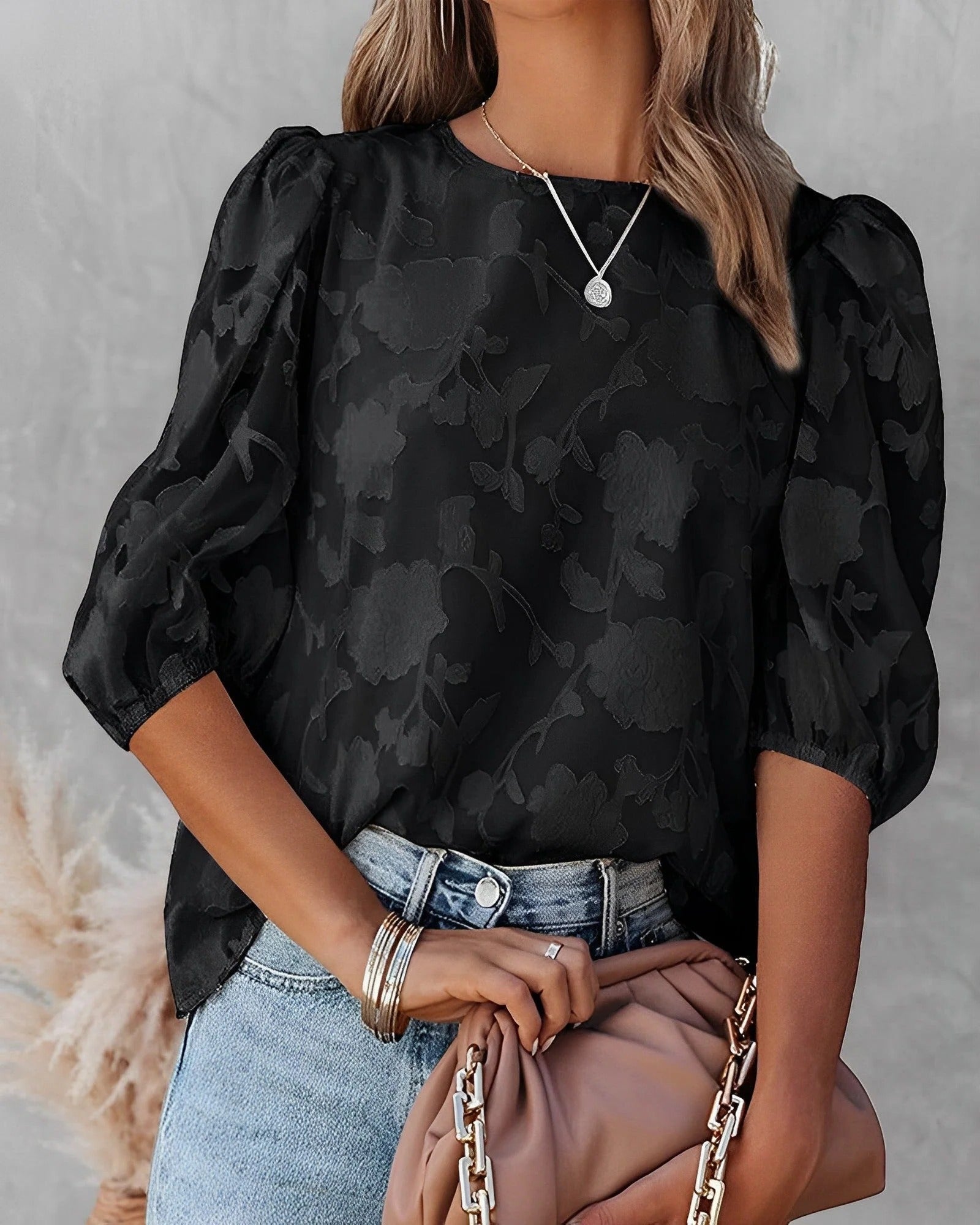 Women's white collarless button-front shirt with structured puff sleeves and gathered volume shoulders