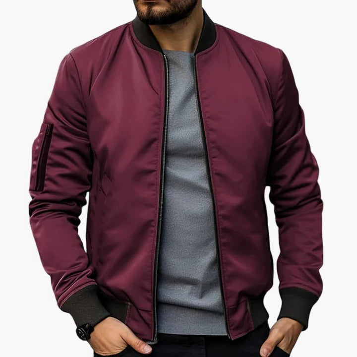 Men's slim fit bomber jacket with lined interior, modern silhouette and front zipper for transitional seasons
